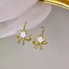 Pendientes de lazo exquisitos para mujer 2024 nueva moda pendientes de camelia únicos de lujo ligero temperamento pendientes de alta gama