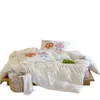 Juego de ropa de cama de cuatro piezas estilo caricatura, clase A, fresco y simple, 100% algodón, algodón lavado, con diseños lindos y versátiles, adecuado para dormitorios de estudiantes, y disponible como juego de tres piezas