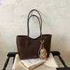 Bolsa de ombro feminina transfronteiriça 2026 nova, bolsa tote simples e casual, grande capacidade, estilo retrô, adequada para escola e trajeto