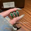 Anillo con hebilla de herradura de jadeíta natural al por mayor del fabricante para Xiaohongshu con incrustación de plata s925, diseño fresco y simple