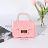 Bolso para niños, bolso de gelatina, bolso pequeño portátil de moda, bolso con cadena de perlas, bonito y a juego, con pegamento crema, venta al por mayor