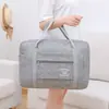 Bolso de mano plegable impermeable de gran capacidad para hombres y mujeres, bolso de viaje de corta distancia, bolso de hombro con ruedas