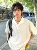Fabricante Directo Patrón Espiga de Trigo Textura Color Sólido Top Falso de Dos Piezas para Hombre, Retro Holgado Versátil Camisa de Manga Corta con Cuello para Parejas