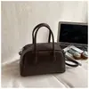 Bolsa de Bowling Retrô Estilo Coreano para Mulheres Outono e Inverno 2025 Nova Moda Bolsa de Ombro de Alto Padrão Bolsa Carteiro Versátil Bolsa Transversal