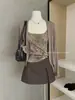 Conjunto de cárdigan simple Y.JIA Yijia para protección solar de principios de otoño + Chaleco con diseño de espalda descubierta + Falda de línea A para mujer 5021