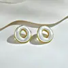 Venta al por mayor del fabricante Transfronterizo En stock Pendientes Redondos de Perla de Gama Alta Moda Lujo Ligero Aguja de Plata S925 Pendientes de Botón Joyería para Mujer