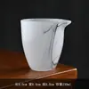 Taza de té de porcelana de jade vidriada verde, separador de té para uso doméstico, taza de té individual resistente al calor y que no quema