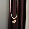 Collar de Calabaza con Trébol de Cuatro Hojas Esmaltado Rosa Fresco Cadena para Clavícula para Mujeres, Estilo de Alta Gama de Nicho, Exportación Transfronteriza