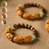 Estilo étnico cuatro no pequeños Buda cuatro no zachilam pulsera Wenwan pulsera de rosario de sándalo de Laoshan plato pulsera para jugar