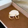 Aretes geométricos redondos de circonita chapados en oro real de 18k, estilo de lujo ligero de alta gama, aretes simples y de moda estilo ins para mujer