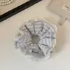 Goma de pelo a rayas versátil y elegante para moño o cola de caballo, Accesorio para el cabello de celebridad de Internet a la moda