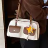 Moda transfronteriza diseño de doble bolsillo bolsa de boliche para mujer nuevo tacto de alta gama bolsa de almohada de una sola pieza bolsa de axila retro moderna