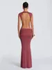 Ropa de Mujer al por Mayor Europea y Americana 2026 Cuello Alto sin Mangas Ajustado de Alta Gama Hueco Revelador de Cintura Sexy Espalda Descubierta Vestido Largo