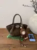 Bolsa de mão fosca de nicho coreana transfronteiriça para mulheres, novo modelo 2026, bolsa de ombro e transversal versátil retrô em camurça