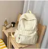 Textura roxa fosca com toque enrugado, mochila bordada de desenho animado para alunos do ensino fundamental II e médio, adequada para ir ao trabalho/escola, passeios e atividades ao ar livre