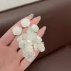 Pendientes de Borlas Estilo Francés Super Hada Pequeños Frescos Explosivos Moda Temperamento Lujo Ligero Alto Sentido Joyería Delicada de Oreja de Camelia
