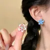 Pendientes de flor de dopamina estilo coreano para mujer, pendientes de botón coloridos asimétricos de colores contrastantes estilo festivo, pendientes versátiles nuevos 2026