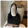 Bolso de Cubo Retro Nicho Versión Coreana Transfronterizo 2025 Nuevo Bolso de Cubo Simple Versátil Bolso de Hombro Personalizado Moderno