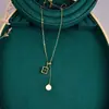 L94 Venta al por mayor de fábrica Collar de acero inoxidable color esmeralda y dorado para mujer, Cadena para clavícula con diseño de otoño, Estilo extensible ajustable