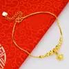Tobillera de Moda Color Arena Dorada Vietnamita Latón Chapado en Oro 24K Campana Doble Capa Giratoria y Transportadora de Cuentas Tobillera para Mujer Exportación Moneda Europea Dorada