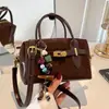 Bolsa de ombro feminina de nicho super popular transfronteiriça, nova moda de verão 2026, bolsa transversal moderna de alta qualidade, bolsa almofada requintada