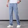 Jeans de mezclilla Tencel de alta gama en color claro para hombre, estilo fino de verano, pantalones rectos holgados de pierna ancha, pantalones casuales retro estilo Hong Kong