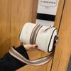 Bolso bandolera de piel de vaca de primera capa con diseño transfronterizo, novedad de 2022, bolso bandolera de gran capacidad, bolso informal de cuero pequeño y redondo para mujer.