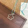 Collar Dulce Corazón de Flor Hueca para Mujer 2026 Modelo Nuevo Cadena Larga de Clavícula de Alta Gama Cadena para el Cuello Versátil y Elegante