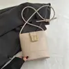 Bolso de mano de alta gama, a la moda, para mujer, nueva colección 2026, chic y retro, bolso tipo cubo simple, bolso cruzado y de hombro de nicho
