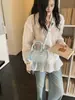 2026 Nova Bolsa de Boliche Exquisita de Alto Valor Estilo Coreano Bolsa Transversal Feminina Moda de Nicho Versátil Leve Bolsa de Mão de Luxo