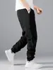 Estação Independente 2026 Calça Esportiva Casual Masculina de Verão Nova Cor Sólida com Cordão Calça Comprida de Trabalho com Múltiplos Bolsos Venda por Atacado