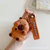 Bolsa de monedas popular de Capibara Llavero Cabeza de silicona Bolsa de almacenamiento para auriculares Bolso colgante Accesorios Regalos pequeños Al por mayor