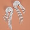 Joyería Pendientes con borlas exageradas Accesorios Venta al por mayor Fábrica de mujeres Pendientes de diamantes de imitación Joyería de sentido avanzado Nuevo suministro transfronterizo
