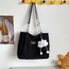 Bolso para estudiante universitaria para mujer, nuevo estilo minimalista 2026, bolso de hombro moderno de gran capacidad, bolso de mano simple para el día a día