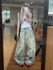 Jeans retro americanos desgastados de dobladillo curvo para hombre y mujer, diseño de otoño, ropa de trabajo, cintura alta, holgados, pierna ancha, pantalones tipo guadaña