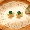 Pendientes Coreanos de Acero Inoxidable en Forma de Abanico Estilo Mid-Century Oro Verde de Alta Gama Lujo Ligero Nicho Pendientes Retro Pendientes para Mujer Venta al por Mayor