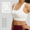 Procesamiento y Personalización de Fábrica de Origen OEM/ODM, Producción de Muestras Según Imágenes Proporcionadas, Listo para Enviar, con Marca de Logo, Sujetador de Yoga con Lazo en la Espalda