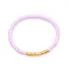 Elegante Pulseira de Contas Roxas com Detalhes Banhados a Ouro Feita com Contas de Argila Polimérica para um Ajuste Confortável e Leve Perfeita para Adicionar um Toque de Cor e Estilo a Qualquer Roupa Design Versátil para Ocasiões Casuais e Formais
