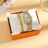 En Stock Nuevo Reloj de Cuarzo con Forma Ovalada Incrustado de Diamantes con Decoración de Correa de Acero a la Moda, Reloj para Mujer con un Estilo Único