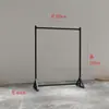 Estante de exhibición para tienda de ropa, perchero de pie para hombres y mujeres, perchero vertical para colgar de lado, arte de hierro simple, pintura horneada negra y dorada