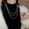 Collar Largo Apilado de Perlas Cadena de Suéter de Nicho Francés Otoño e Invierno Lujo Ligero Elegante Collar al por Mayor Exquisito