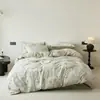 Nuevo juego de ropa de cama de cuatro piezas de gasa doble estampada, grado A, apto para bebés y madres, ropa de cama tejida estampada de doble capa para todas las estaciones