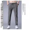 Fabricante transfronterizo de comercio exterior al por mayor de pantalones deportivos casuales de verano de talla grande de secado rápido para hombre, pantalones rectos holgados transpirables de seda de hielo