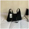 Bolso de Axila Retro de Nicho para Mujer 2026 Primavera Nuevo Bolso Tote de Moda Bolso Cruzado de Gran Capacidad Simple Bolso de Viaje