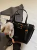 Bolso tipo cubo tote retro casual versátil para mujer, nuevo estilo 2026, de alta calidad, elegante bolso de hombro, bolso cruzado de moda