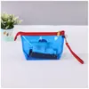 Bolsa de cosméticos transparente impermeable de PVC de venta caliente, bolsa con cremallera, bolsa de almacenamiento portátil para viaje, multifuncional, para lavar, para traje de baño
