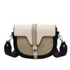 Bolsa de nicho estilo francês feminina 2024 outono e inverno nova bolsa de ombro estilo ocidental de alta qualidade bolsa de sela de bloco de cores de PU
