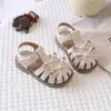Sandálias Infantis 2026 Verão Novo Estilo Sapatos de Princesa Bebê Criança Pequena Solado Macio Antiderrapante Sapatos de Bebê com Laço Design Simples