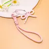 Correa de teléfono con lazo dulce, cordón tejido, cordón anti-pérdida, accesorio para llavero, charm para bolso, material hecho a mano, accesorios al por mayor