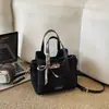 Colección de otoño 2026 transfronteriza: un bolso tote elegante y versátil de gran capacidad, bolso de hombro y bolso cruzado tipo cubo para mujer